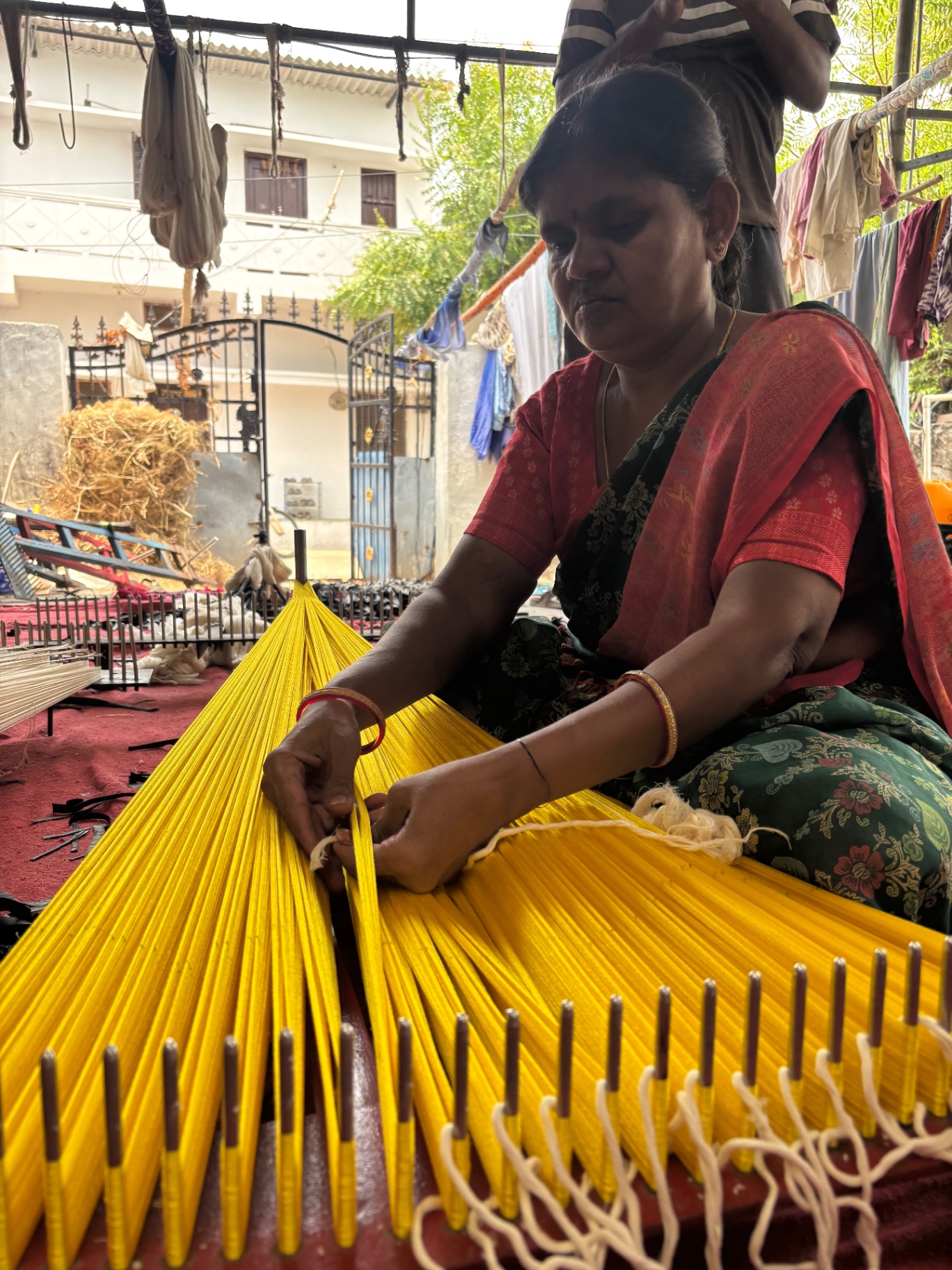 Warping the yellow silk